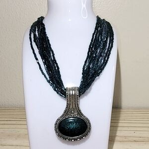 Multi Strand Beaded Necklace With Large Silver Tone Pendant Teal Blue Green